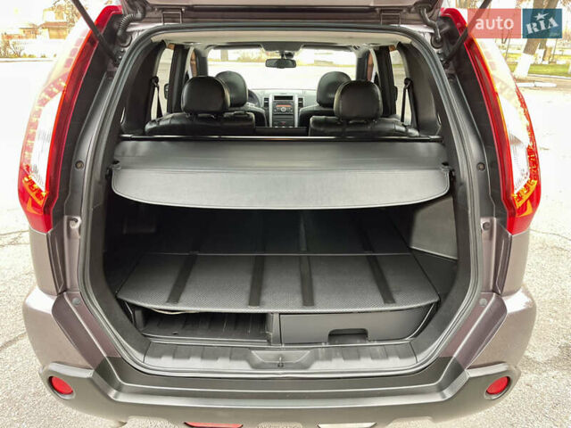 Фіолетовий Ніссан ІксТрейл, об'ємом двигуна 2 л та пробігом 190 тис. км за 10900 $, фото 27 на Automoto.ua