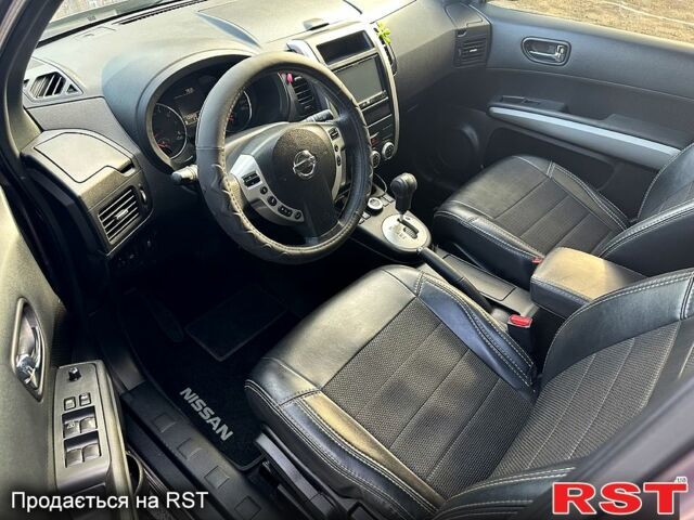 Фиолетовый Ниссан ИксТрейл, объемом двигателя 2.5 л и пробегом 124 тыс. км за 11500 $, фото 4 на Automoto.ua