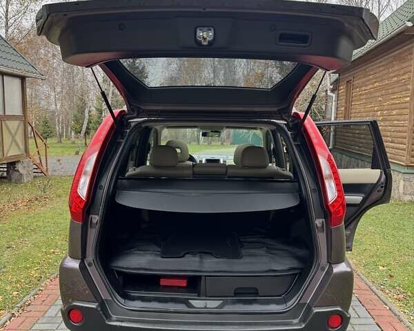 Фиолетовый Ниссан ИксТрейл, объемом двигателя 2 л и пробегом 210 тыс. км за 14800 $, фото 59 на Automoto.ua