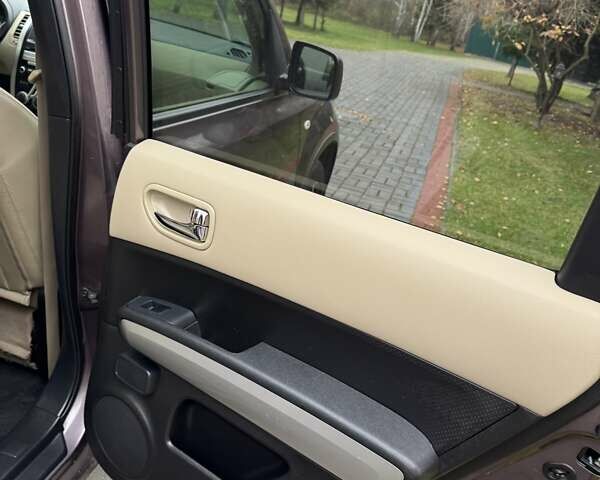 Фиолетовый Ниссан ИксТрейл, объемом двигателя 2 л и пробегом 210 тыс. км за 14800 $, фото 45 на Automoto.ua