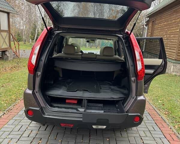 Фиолетовый Ниссан ИксТрейл, объемом двигателя 2 л и пробегом 210 тыс. км за 14800 $, фото 57 на Automoto.ua