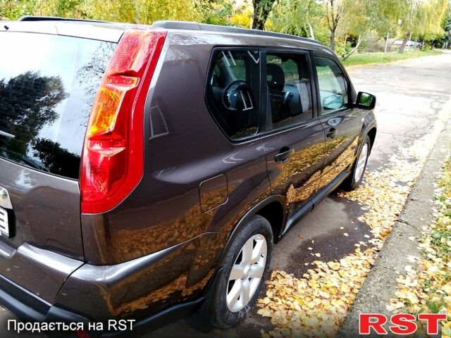 Коричневый Ниссан ИксТрейл, объемом двигателя 2 л и пробегом 211 тыс. км за 8800 $, фото 5 на Automoto.ua