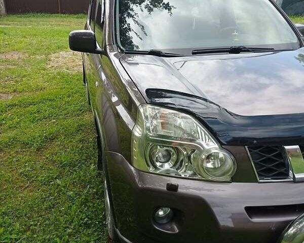 Коричневый Ниссан ИксТрейл, объемом двигателя 2 л и пробегом 285 тыс. км за 8600 $, фото 4 на Automoto.ua