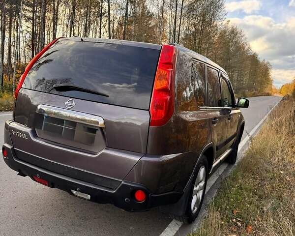Коричневый Ниссан ИксТрейл, объемом двигателя 2 л и пробегом 263 тыс. км за 10200 $, фото 11 на Automoto.ua
