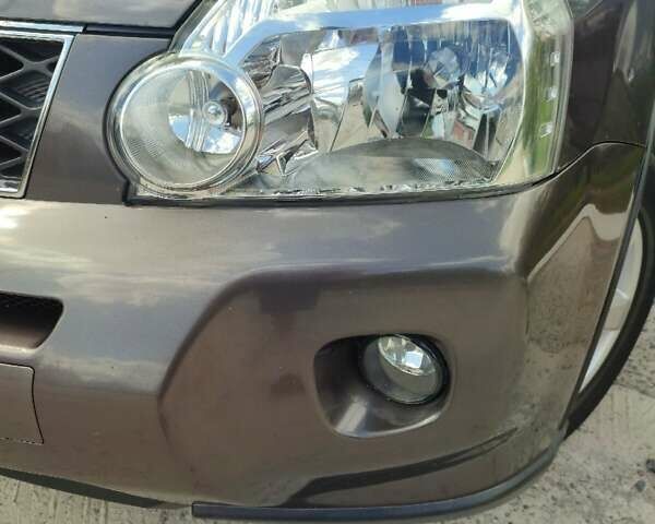 Коричневый Ниссан ИксТрейл, объемом двигателя 2 л и пробегом 238 тыс. км за 9450 $, фото 8 на Automoto.ua