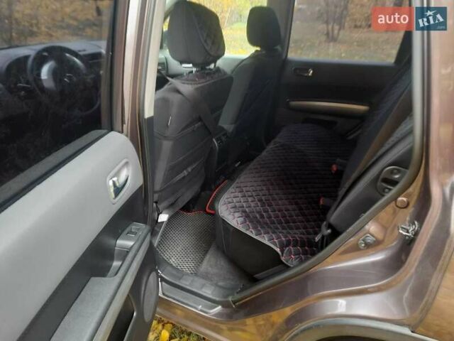 Коричневый Ниссан ИксТрейл, объемом двигателя 2 л и пробегом 246 тыс. км за 8999 $, фото 7 на Automoto.ua