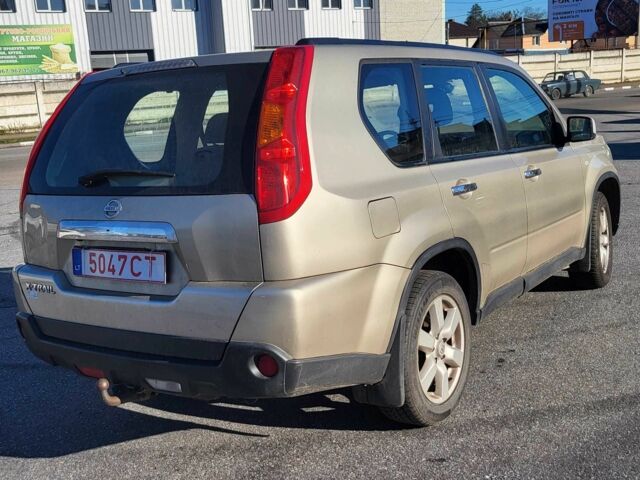 Коричневий Ніссан ІксТрейл, об'ємом двигуна 2 л та пробігом 208 тис. км за 5456 $, фото 3 на Automoto.ua