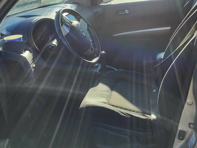 Коричневий Ніссан ІксТрейл, об'ємом двигуна 2 л та пробігом 208 тис. км за 5456 $, фото 13 на Automoto.ua