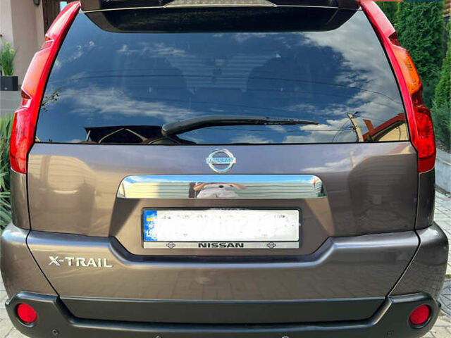 Коричневый Ниссан ИксТрейл, объемом двигателя 2.49 л и пробегом 154 тыс. км за 10800 $, фото 4 на Automoto.ua