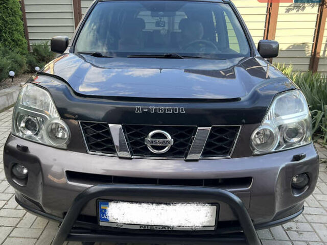 Коричневый Ниссан ИксТрейл, объемом двигателя 2.49 л и пробегом 154 тыс. км за 10800 $, фото 1 на Automoto.ua