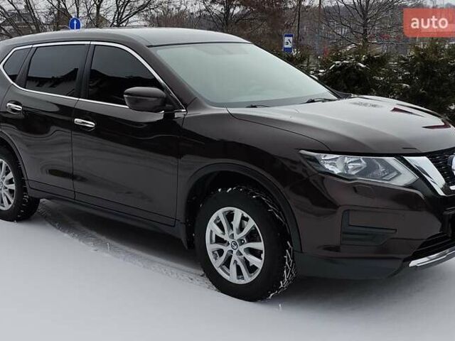 Коричневый Ниссан ИксТрейл, объемом двигателя 2 л и пробегом 129 тыс. км за 18300 $, фото 1 на Automoto.ua