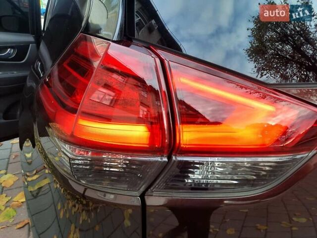 Коричневый Ниссан ИксТрейл, объемом двигателя 2 л и пробегом 75 тыс. км за 20800 $, фото 62 на Automoto.ua