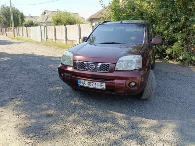 Красный Ниссан ИксТрейл, объемом двигателя 2.2 л и пробегом 400 тыс. км за 4700 $, фото 3 на Automoto.ua