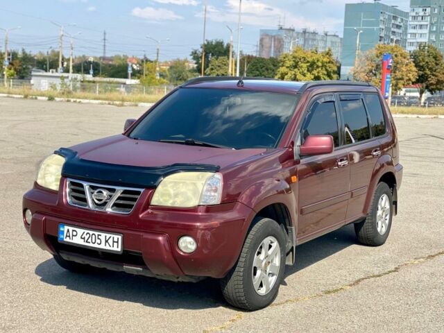 Красный Ниссан ИксТрейл, объемом двигателя 2.2 л и пробегом 337 тыс. км за 3599 $, фото 1 на Automoto.ua