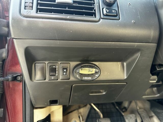 Красный Ниссан ИксТрейл, объемом двигателя 2.2 л и пробегом 421 тыс. км за 4000 $, фото 5 на Automoto.ua