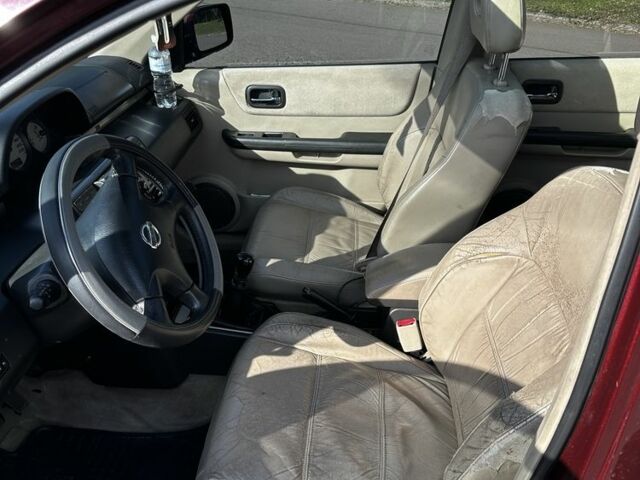 Красный Ниссан ИксТрейл, объемом двигателя 2.2 л и пробегом 421 тыс. км за 4000 $, фото 2 на Automoto.ua