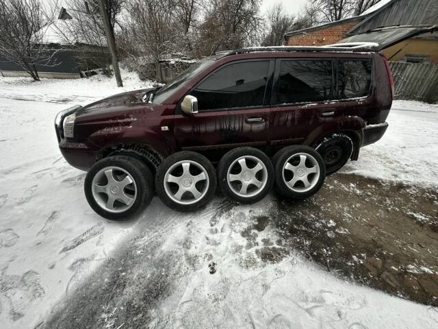 Красный Ниссан ИксТрейл, объемом двигателя 2.2 л и пробегом 421 тыс. км за 4000 $, фото 7 на Automoto.ua