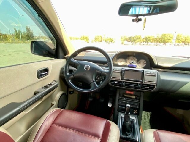 Красный Ниссан ИксТрейл, объемом двигателя 2.2 л и пробегом 337 тыс. км за 3599 $, фото 10 на Automoto.ua