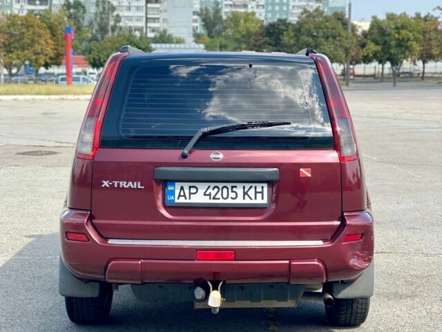 Красный Ниссан ИксТрейл, объемом двигателя 2.2 л и пробегом 337 тыс. км за 3599 $, фото 7 на Automoto.ua