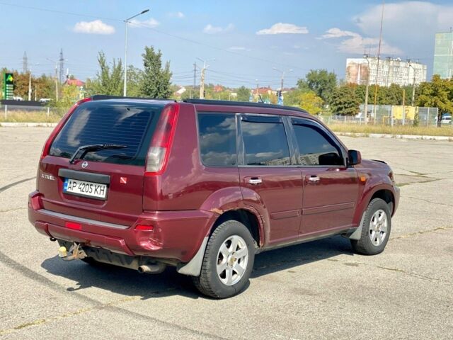 Красный Ниссан ИксТрейл, объемом двигателя 2.2 л и пробегом 337 тыс. км за 3599 $, фото 6 на Automoto.ua