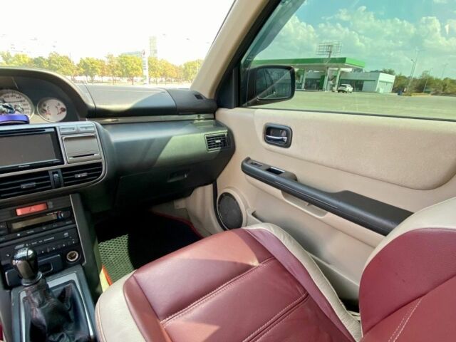 Красный Ниссан ИксТрейл, объемом двигателя 2.2 л и пробегом 337 тыс. км за 3599 $, фото 9 на Automoto.ua