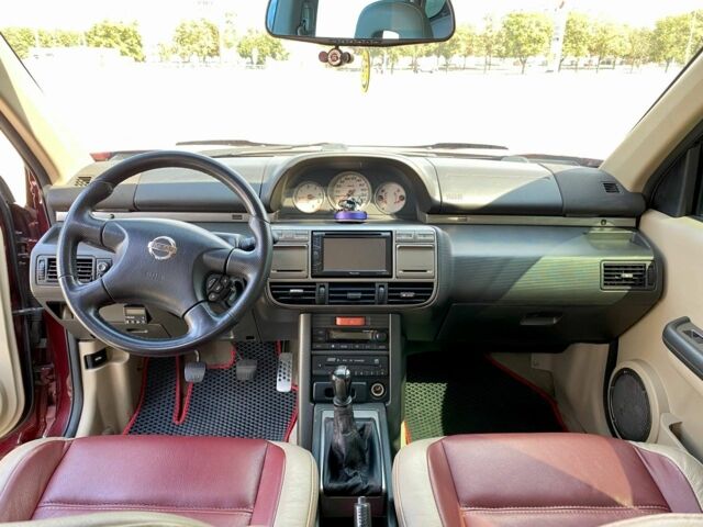 Красный Ниссан ИксТрейл, объемом двигателя 2.2 л и пробегом 337 тыс. км за 3599 $, фото 8 на Automoto.ua