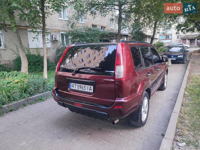Красный Ниссан ИксТрейл, объемом двигателя 2 л и пробегом 342 тыс. км за 6000 $, фото 9 на Automoto.ua