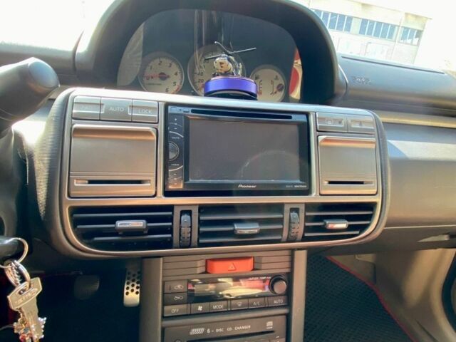 Красный Ниссан ИксТрейл, объемом двигателя 2.2 л и пробегом 337 тыс. км за 3599 $, фото 17 на Automoto.ua