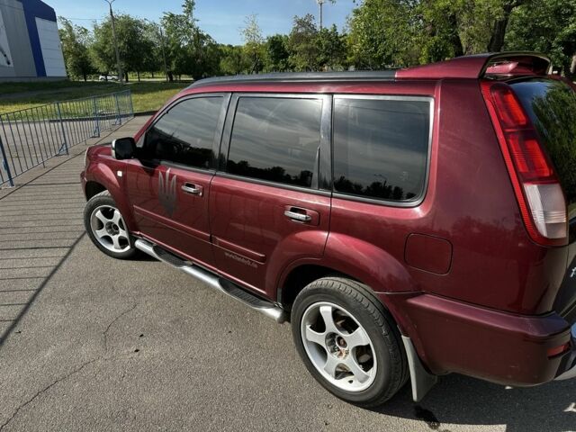 Красный Ниссан ИксТрейл, объемом двигателя 2.2 л и пробегом 421 тыс. км за 4000 $, фото 1 на Automoto.ua