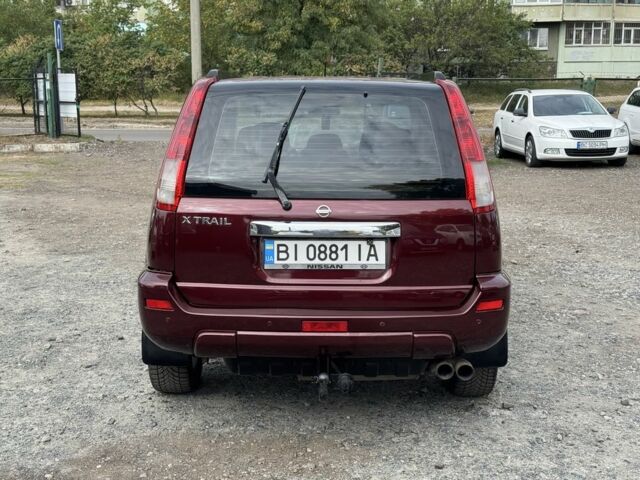 Красный Ниссан ИксТрейл, объемом двигателя 2 л и пробегом 220 тыс. км за 6000 $, фото 7 на Automoto.ua
