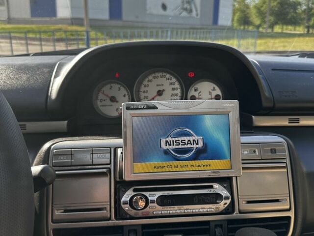 Красный Ниссан ИксТрейл, объемом двигателя 2.2 л и пробегом 421 тыс. км за 4000 $, фото 3 на Automoto.ua