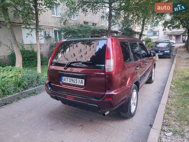Красный Ниссан ИксТрейл, объемом двигателя 2 л и пробегом 342 тыс. км за 6000 $, фото 6 на Automoto.ua