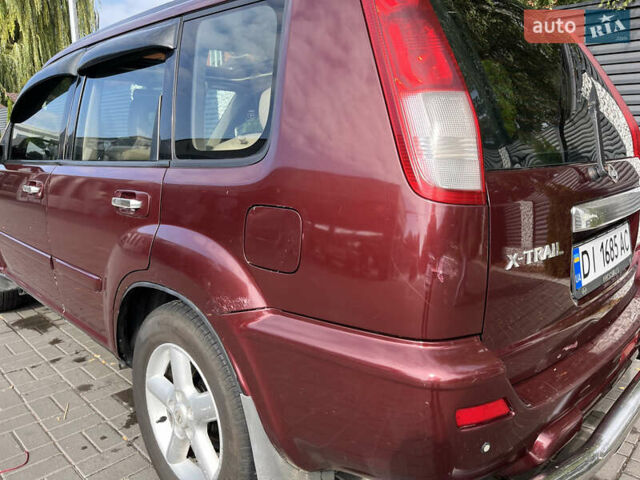 Червоний Ніссан ІксТрейл, об'ємом двигуна 2 л та пробігом 294 тис. км за 5800 $, фото 6 на Automoto.ua