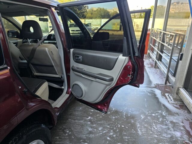 Червоний Ніссан ІксТрейл, об'ємом двигуна 2 л та пробігом 250 тис. км за 4499 $, фото 8 на Automoto.ua