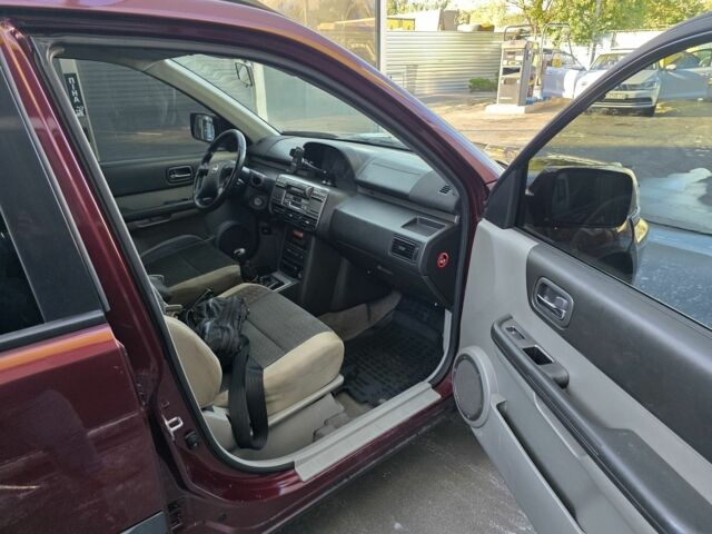 Червоний Ніссан ІксТрейл, об'ємом двигуна 2 л та пробігом 250 тис. км за 4499 $, фото 6 на Automoto.ua