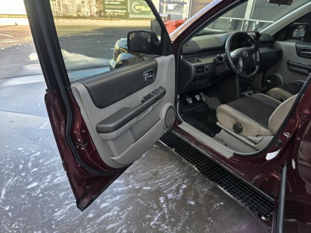 Червоний Ніссан ІксТрейл, об'ємом двигуна 2 л та пробігом 250 тис. км за 4499 $, фото 10 на Automoto.ua