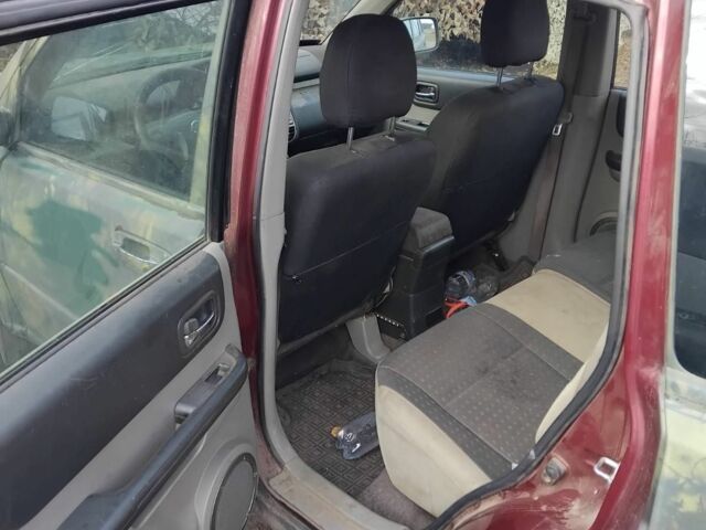 Красный Ниссан ИксТрейл, объемом двигателя 2.2 л и пробегом 450 тыс. км за 1430 $, фото 2 на Automoto.ua