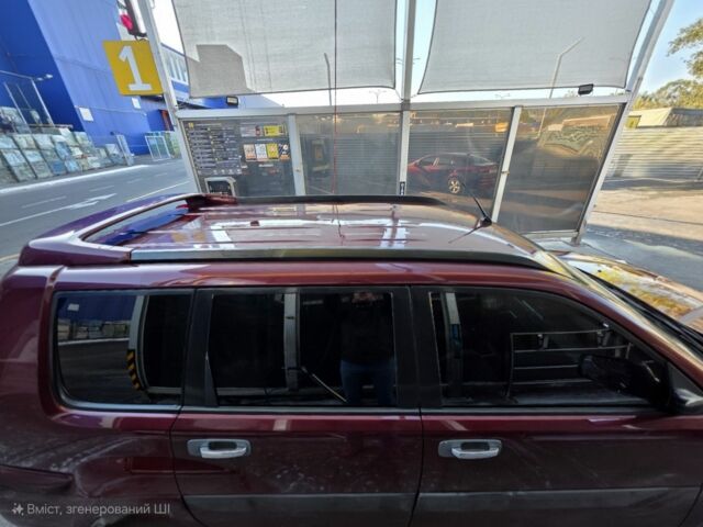 Червоний Ніссан ІксТрейл, об'ємом двигуна 2 л та пробігом 250 тис. км за 4499 $, фото 3 на Automoto.ua