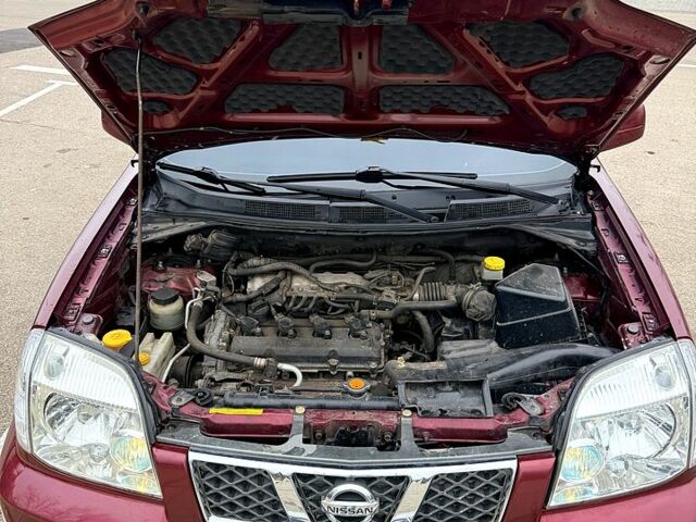 Красный Ниссан ИксТрейл, объемом двигателя 2.5 л и пробегом 270 тыс. км за 5600 $, фото 9 на Automoto.ua