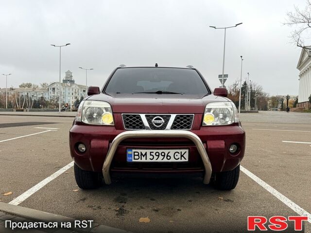 Красный Ниссан ИксТрейл, объемом двигателя 2.5 л и пробегом 270 тыс. км за 5600 $, фото 12 на Automoto.ua