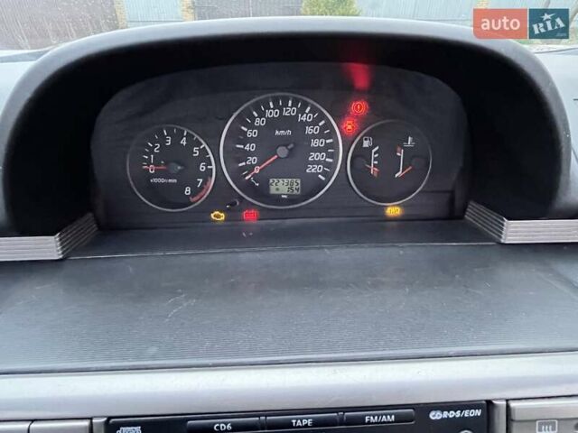 Красный Ниссан ИксТрейл, объемом двигателя 2 л и пробегом 227 тыс. км за 7250 $, фото 6 на Automoto.ua