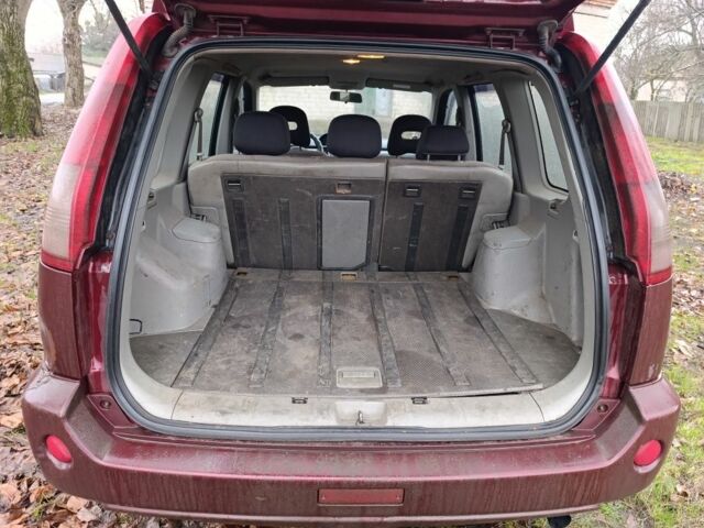 Красный Ниссан ИксТрейл, объемом двигателя 2.2 л и пробегом 400 тыс. км за 3500 $, фото 11 на Automoto.ua