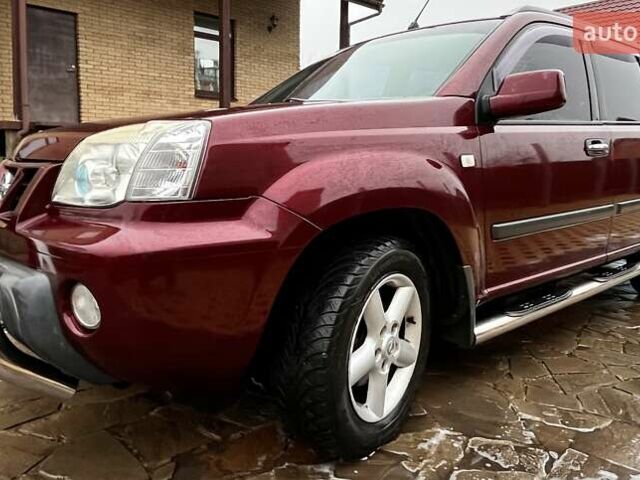 Красный Ниссан ИксТрейл, объемом двигателя 2 л и пробегом 227 тыс. км за 7250 $, фото 21 на Automoto.ua