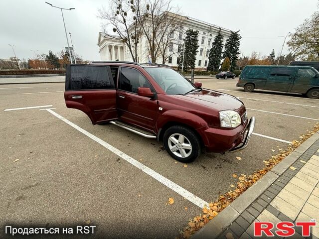 Красный Ниссан ИксТрейл, объемом двигателя 2.5 л и пробегом 270 тыс. км за 5600 $, фото 11 на Automoto.ua