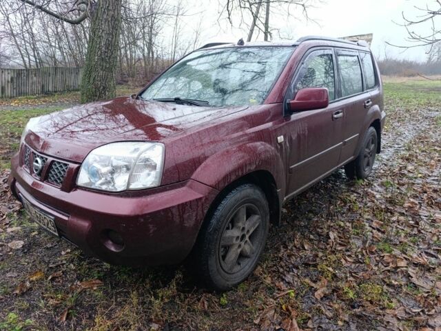 Красный Ниссан ИксТрейл, объемом двигателя 2.2 л и пробегом 400 тыс. км за 3500 $, фото 1 на Automoto.ua