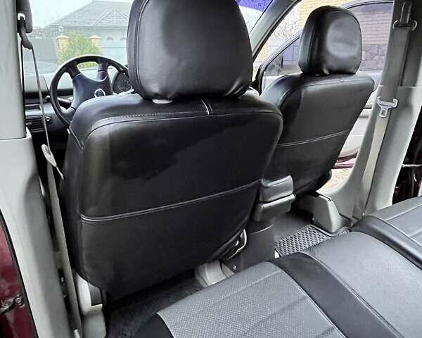 Красный Ниссан ИксТрейл, объемом двигателя 2 л и пробегом 227 тыс. км за 7250 $, фото 15 на Automoto.ua