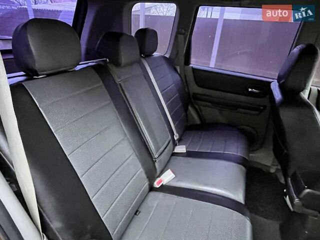 Красный Ниссан ИксТрейл, объемом двигателя 2 л и пробегом 227 тыс. км за 7250 $, фото 13 на Automoto.ua