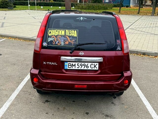 Красный Ниссан ИксТрейл, объемом двигателя 2.5 л и пробегом 270 тыс. км за 5600 $, фото 8 на Automoto.ua