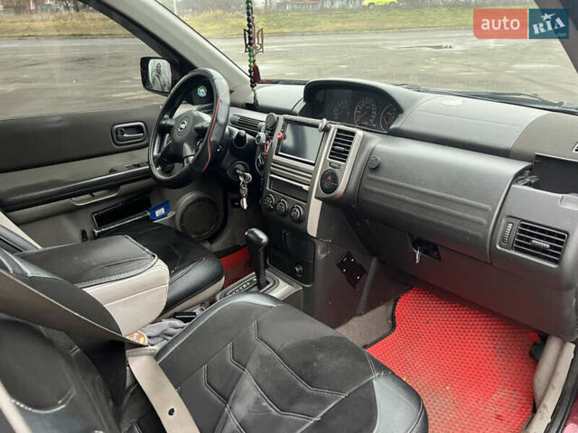 Красный Ниссан ИксТрейл, объемом двигателя 2.49 л и пробегом 298 тыс. км за 5999 $, фото 8 на Automoto.ua