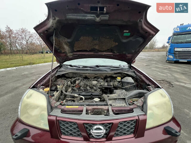 Красный Ниссан ИксТрейл, объемом двигателя 2.49 л и пробегом 298 тыс. км за 5999 $, фото 6 на Automoto.ua